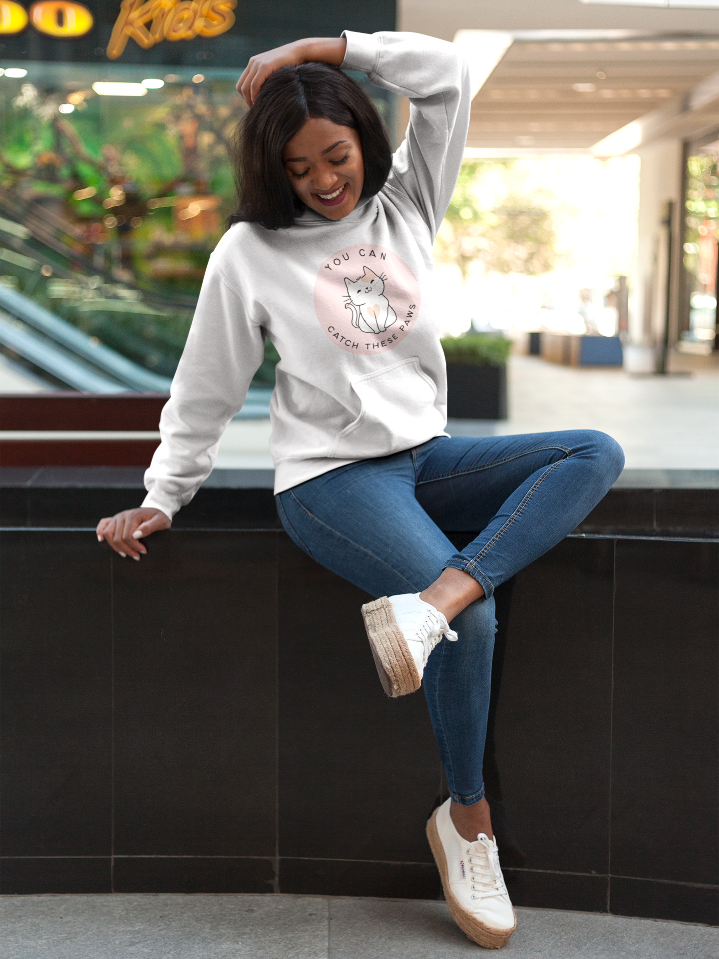 Cozy cat-themed hoodie featuring a playful smiling cat and the phrase “You Can Catch These Paws” — perfect gift for fun-loving cat owners | Kitty Crush