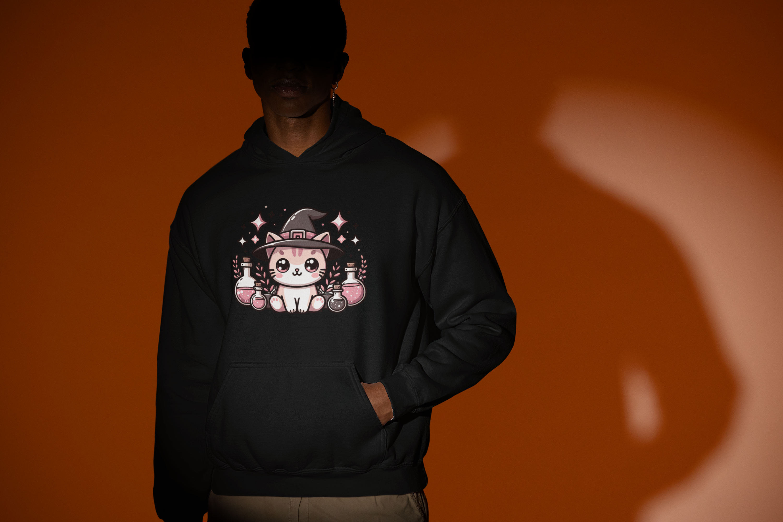 Cozy hoodie featuring a magical cat surrounded by potion bottles — perfect for cat lovers who adore mystical, witchy designs.
